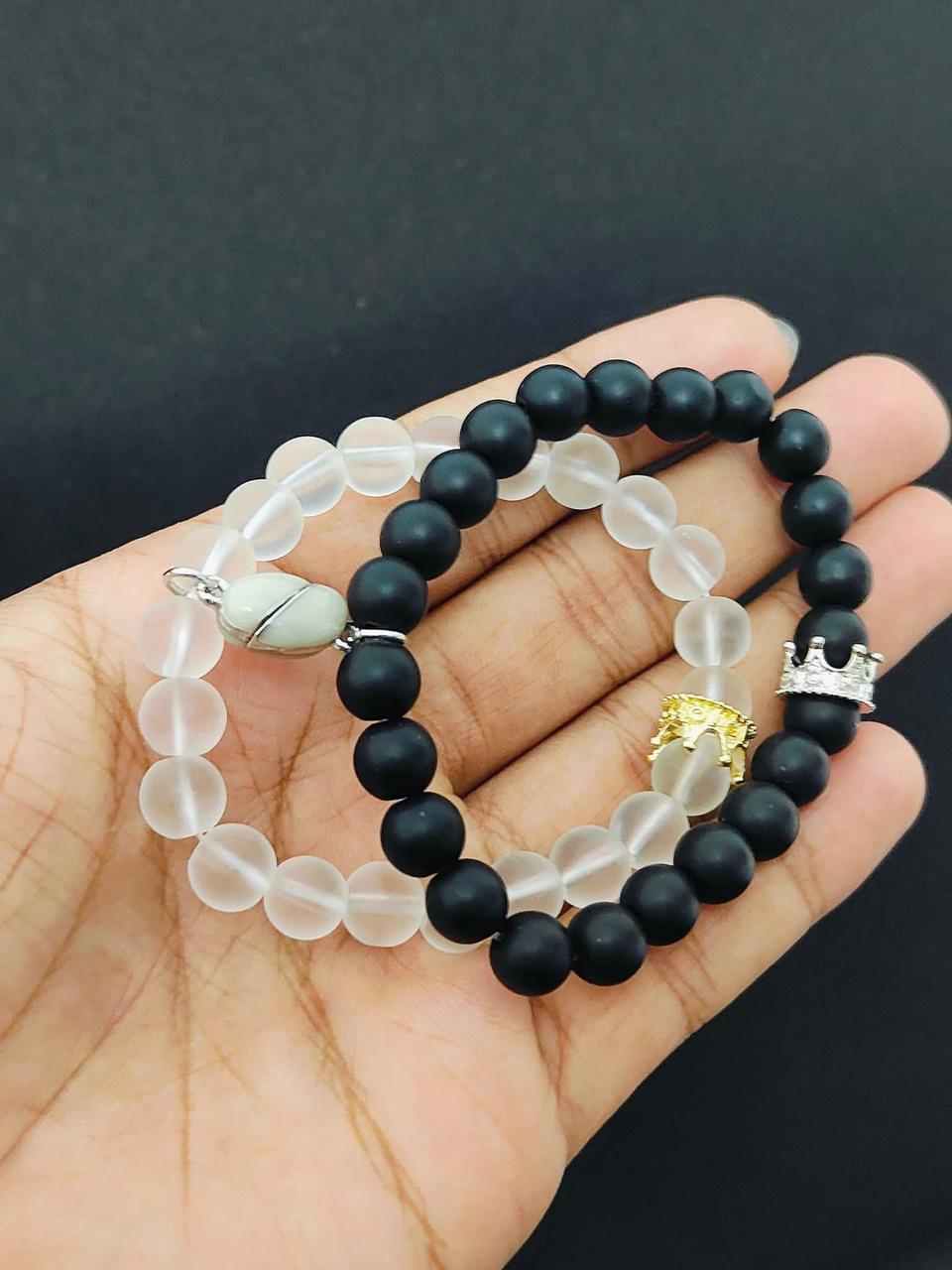 Picture of Shop Pro Magnetic Heart Bracelets for Couples (2 Piece) | Small Rubber Band Magnet Stone Bell Bracelet with Knotted Head Rope
