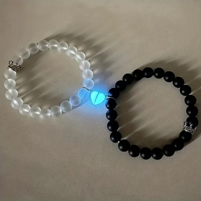 Picture of Shop Pro Magnetic Heart Bracelets for Couples (2 Piece) | Small Rubber Band Magnet Stone Bell Bracelet with Knotted Head Rope