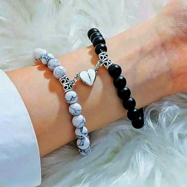 Picture of Love  Magnetic Heart Bracelets for Couples (2 Piece) | Small Rubber Band Magnet Stone Bell Bracelet with Knotted Head Rope