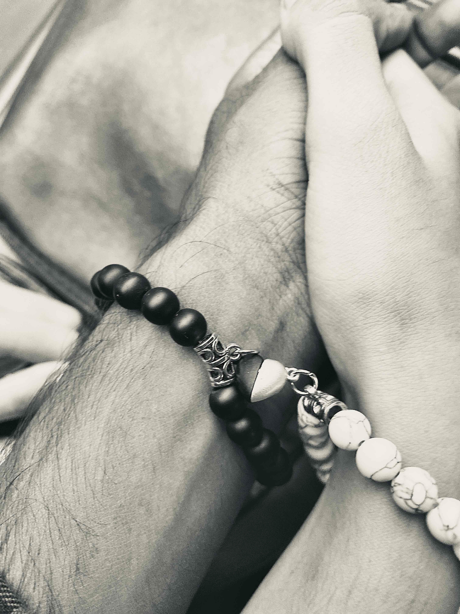 Picture of Love  Magnetic Heart Bracelets for Couples (2 Piece) | Small Rubber Band Magnet Stone Bell Bracelet with Knotted Head Rope