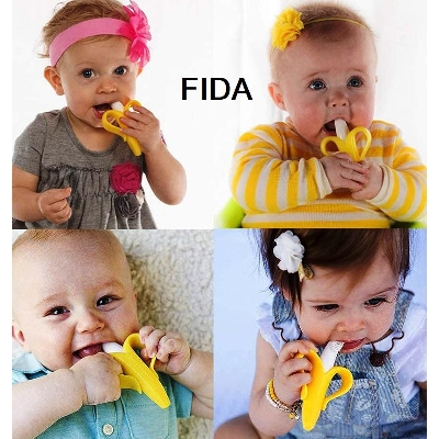 Picture of Banana baby toothbrush cum teether training brush flexible soft Toy Multicolor 